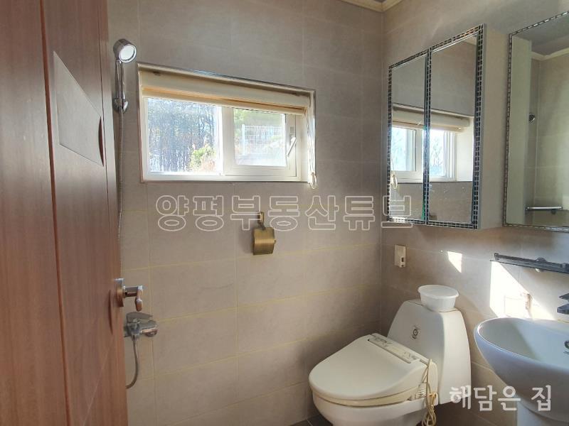 동일한 디자인의 건축으로 조성된 전원단지내 단층주택_15